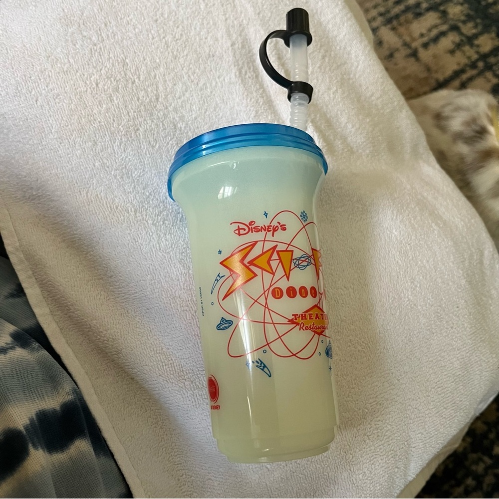 This is a vintage DisneySci Fi cup with blue lid and flexible plastic straw with
